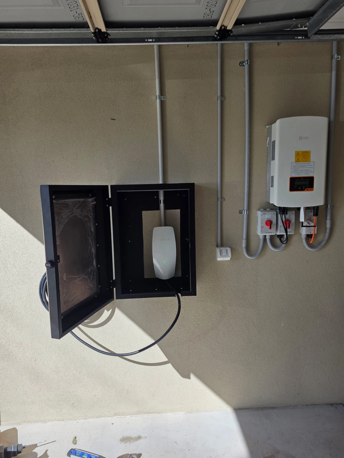 final look of tesla ev charger after installation